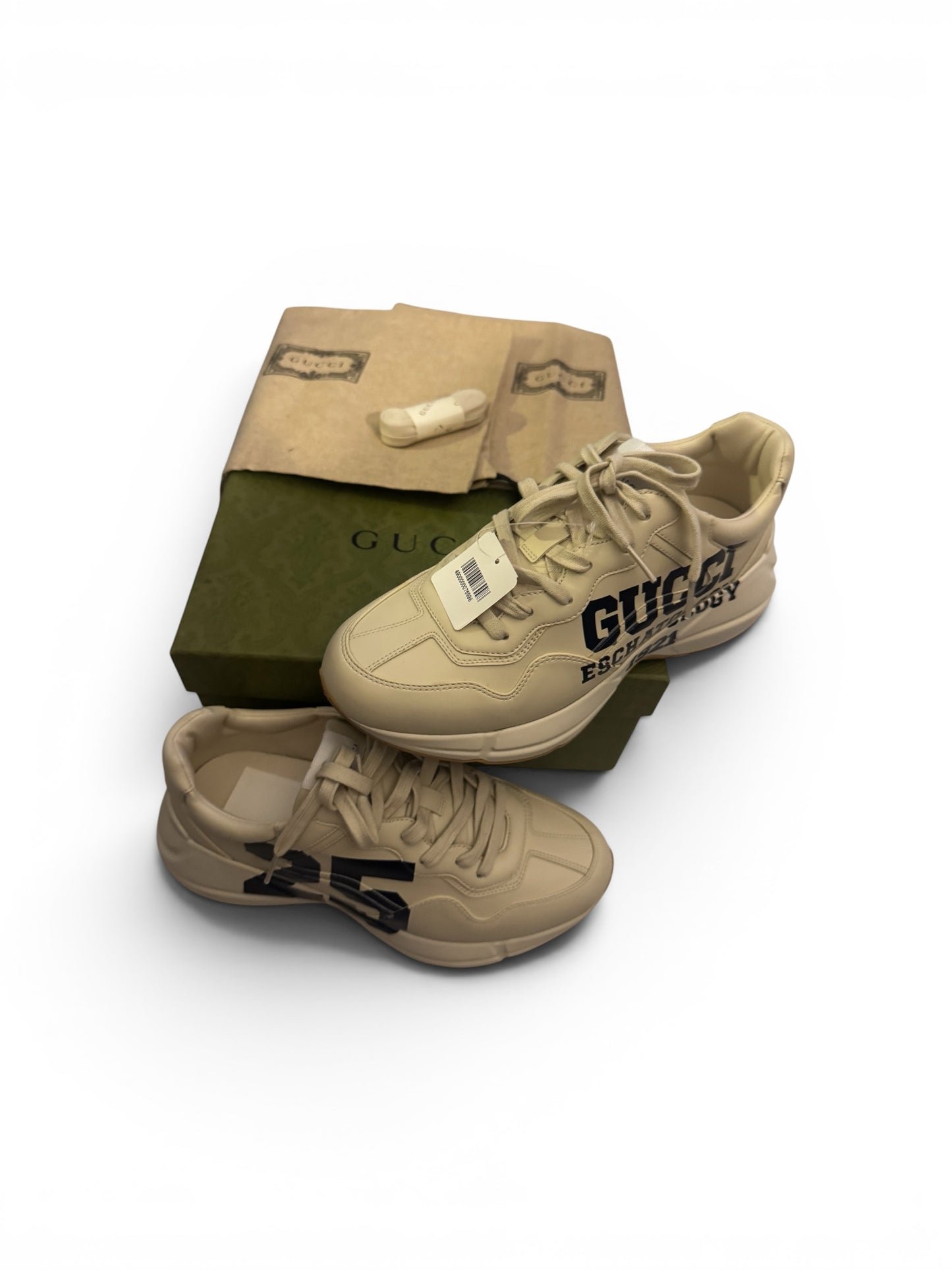 The Gucci Eschatology Rhyton leather sneaker with "Gucci Eschatology 1921" and "25" script.