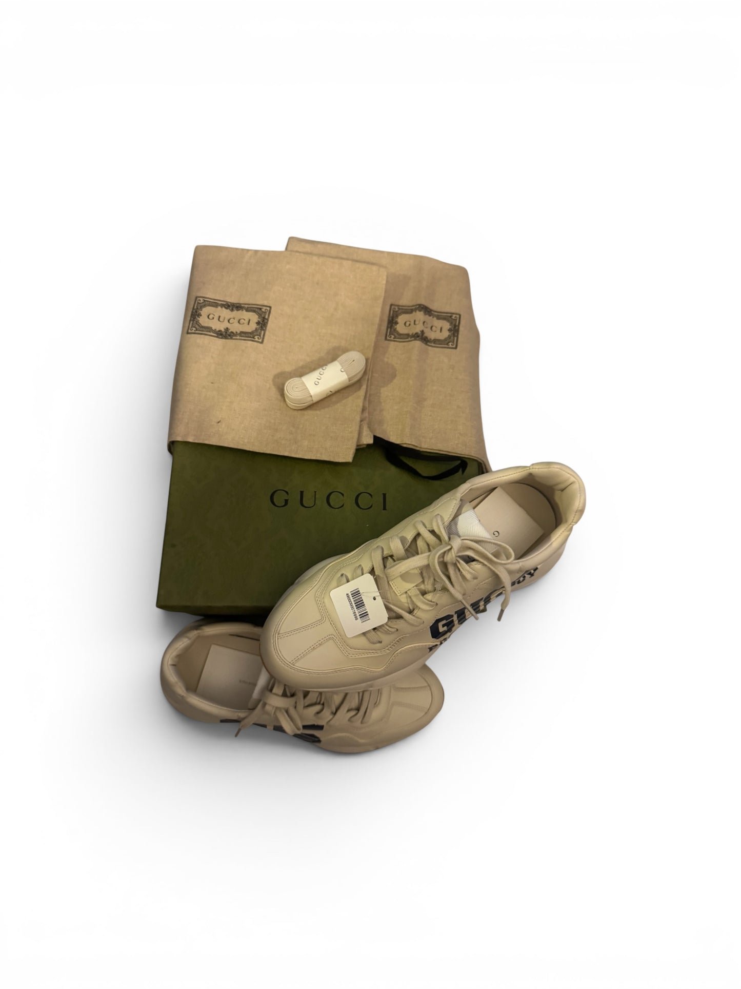 The Gucci Eschatology Rhyton leather sneaker with "Gucci Eschatology 1921" and "25" script.